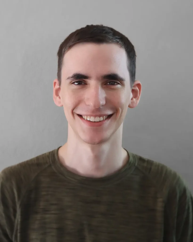 Headshot of owner, Jakin Stahl, smiling confidently